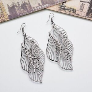 NWT feather earrings